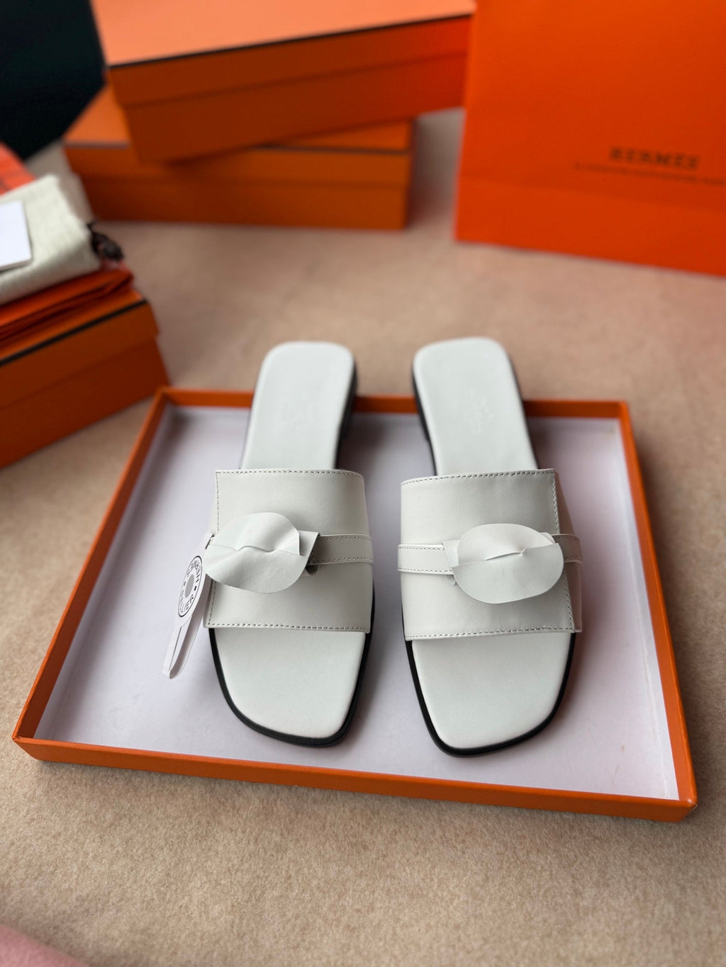 HERMES 0RAN SANDALS IN WHITE CALFSKIN