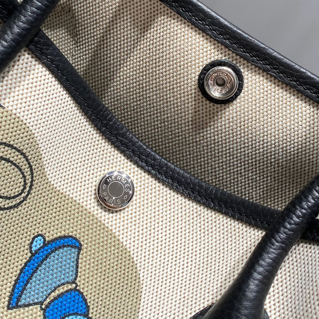 HERMES GARDEN PARTY 36 IN BLUE IVORY TOILE H CANVAS BLACK CALFSKIN EQUESTRIAN HARNESS PRINT