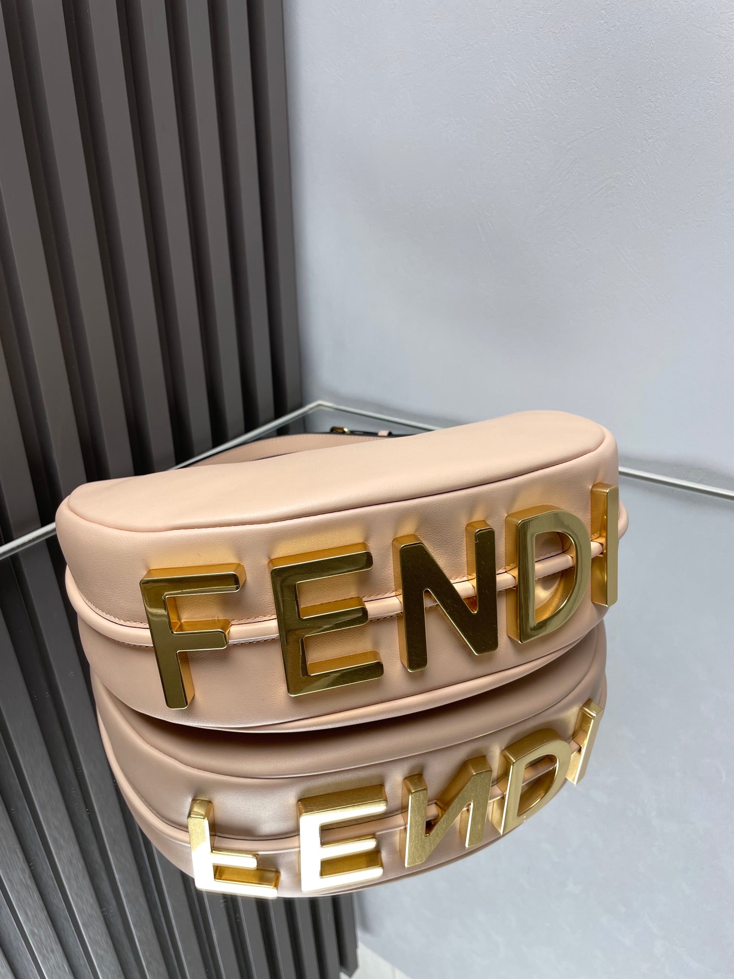FENDIGRAPHY MEDIUM 29 IN BISQUE SMOOTH LAMBSKIN GOLD HARDWARE