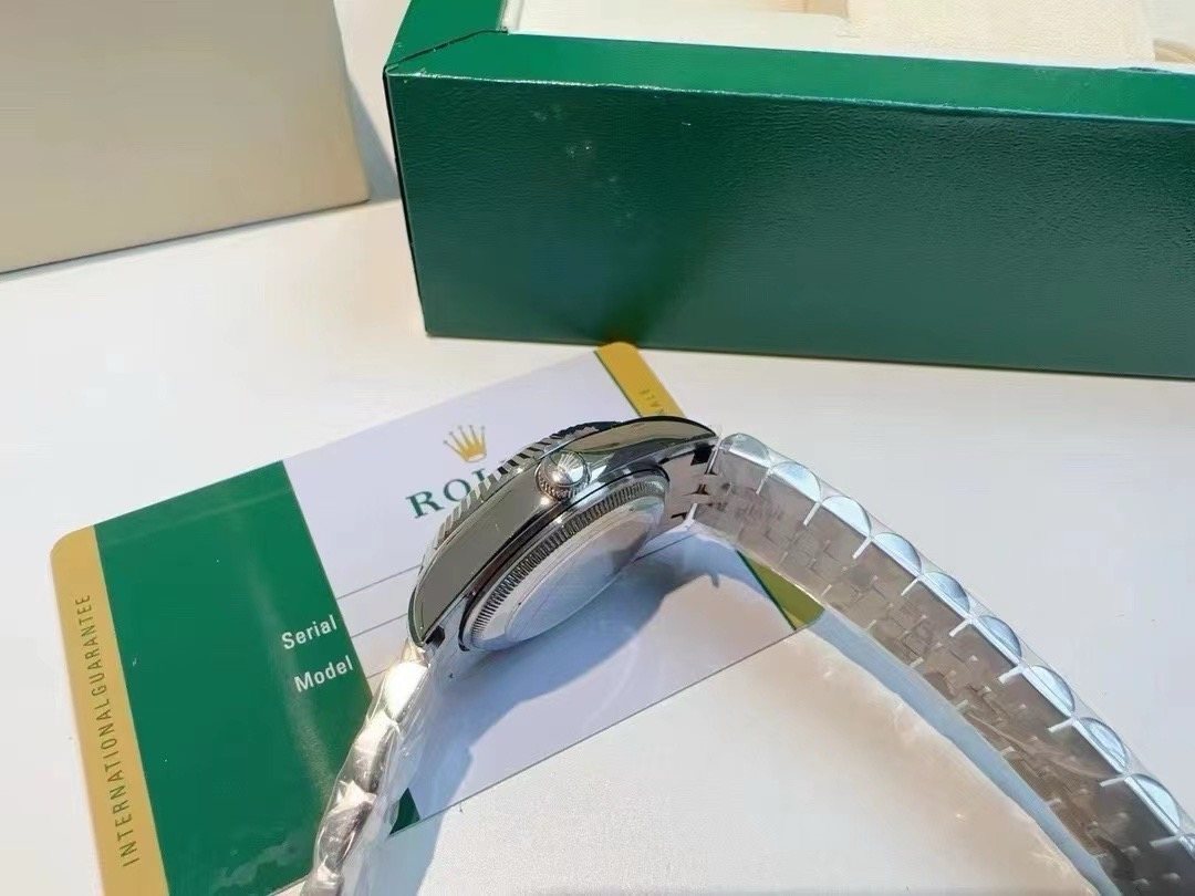 Rolex Pink Dial Silver Bracelet Watch