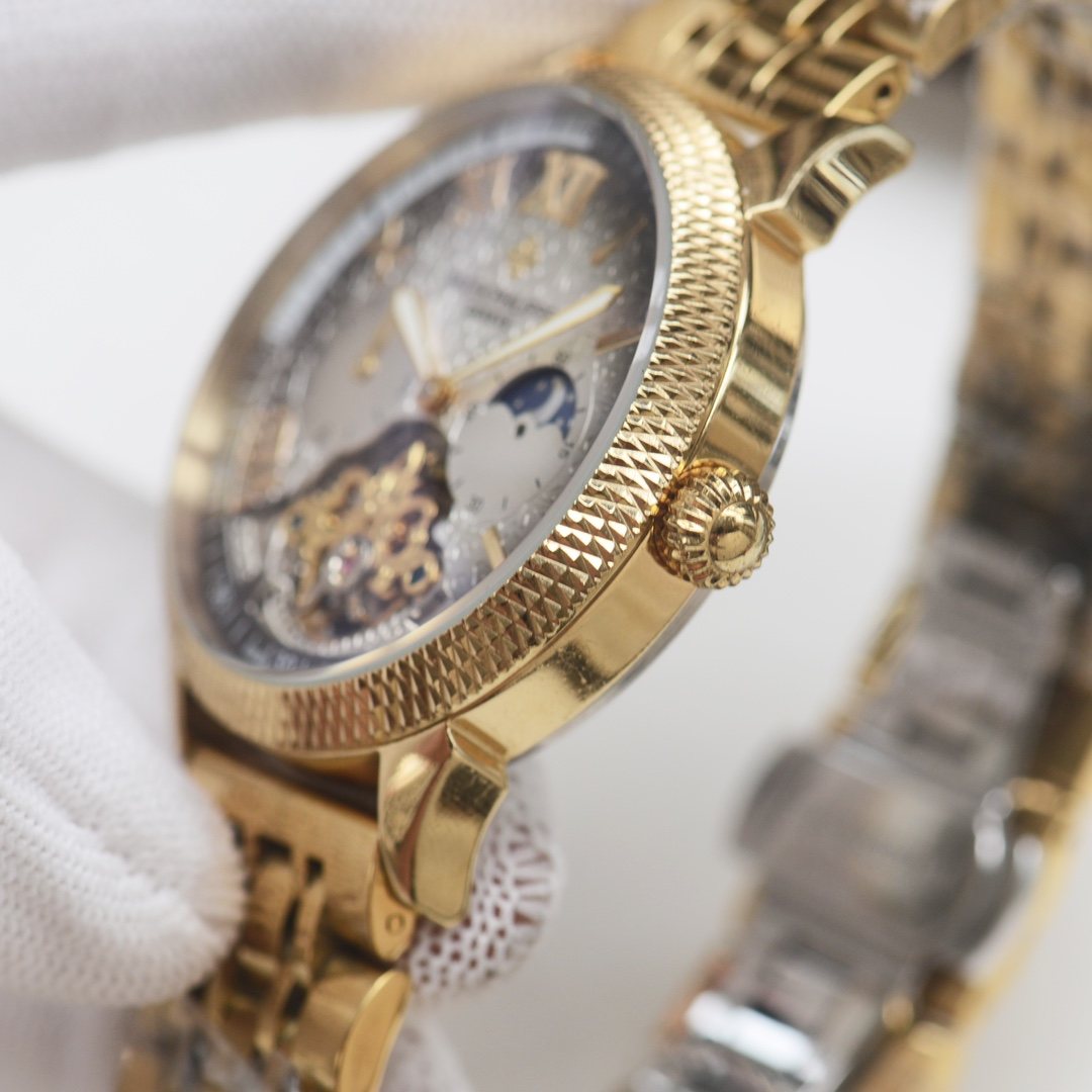 Patek Philippe Gold Silver Dial Bracelet Watch