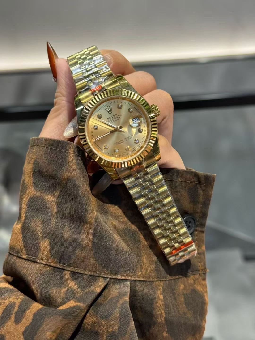 Rolex Gold-Tone Champagne Dial Watch